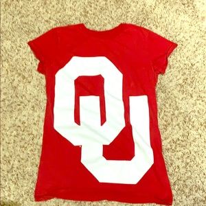 Red OU shirt with big white logo